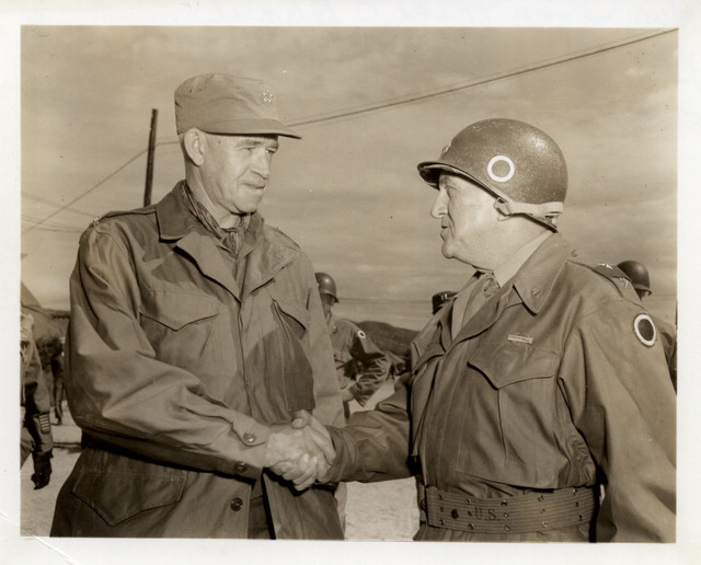 General Omar Bradley shaking hands with General Mike O’ Daniel.jpg