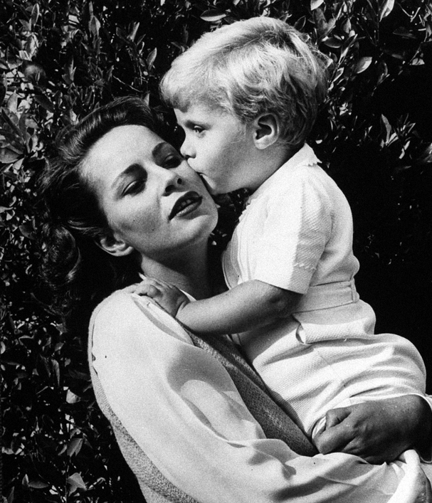 Alida Valli getting a kiss from her son..jpg
