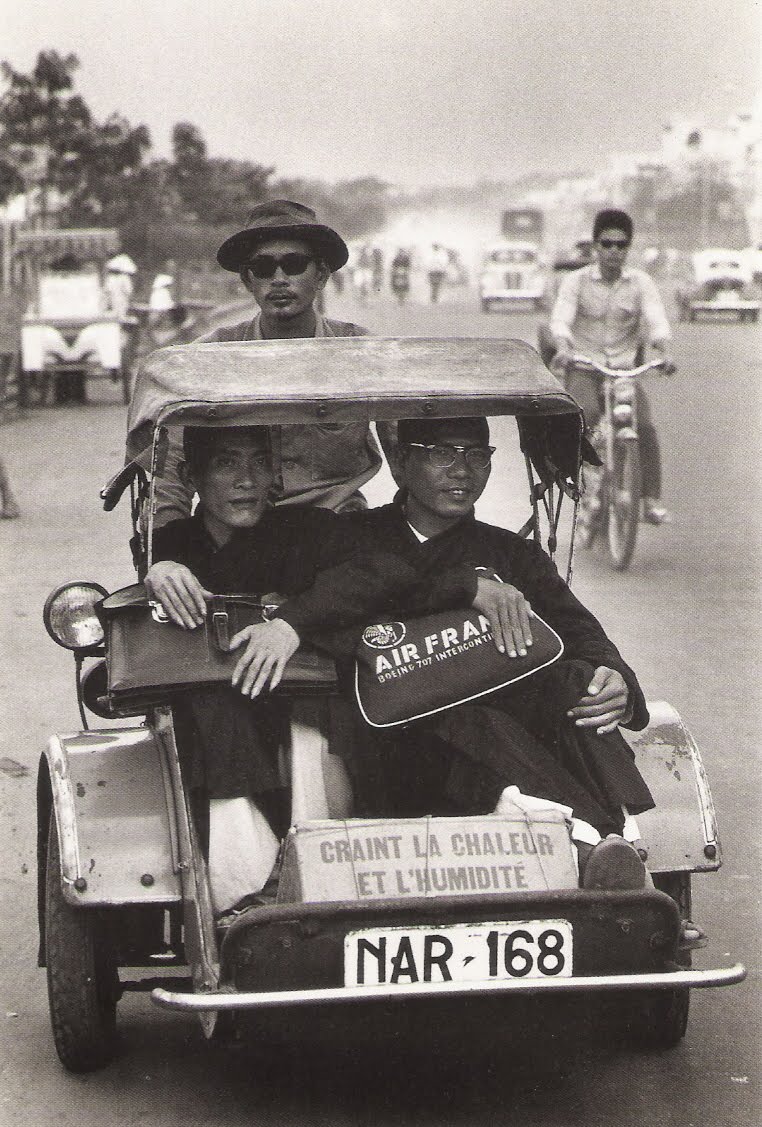 Henri Dauman. Two monks in Saigon. Viet-Nam. 1964.jpg