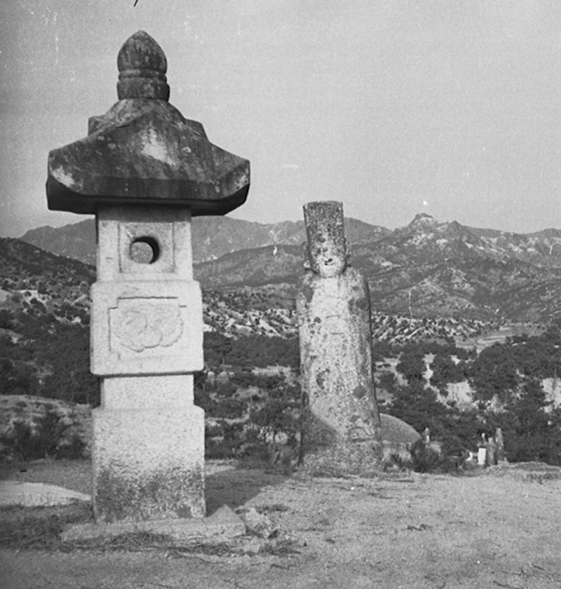 Stone lantern and monument near the 326th CRC area. Korea, 1952.jpg