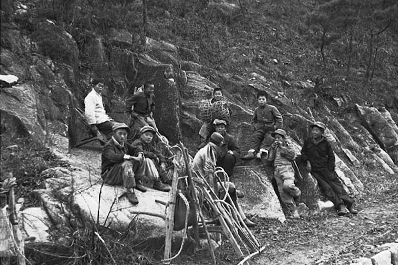 Boys on the way up the hills for wood. North of Seoul. 1952.jpg