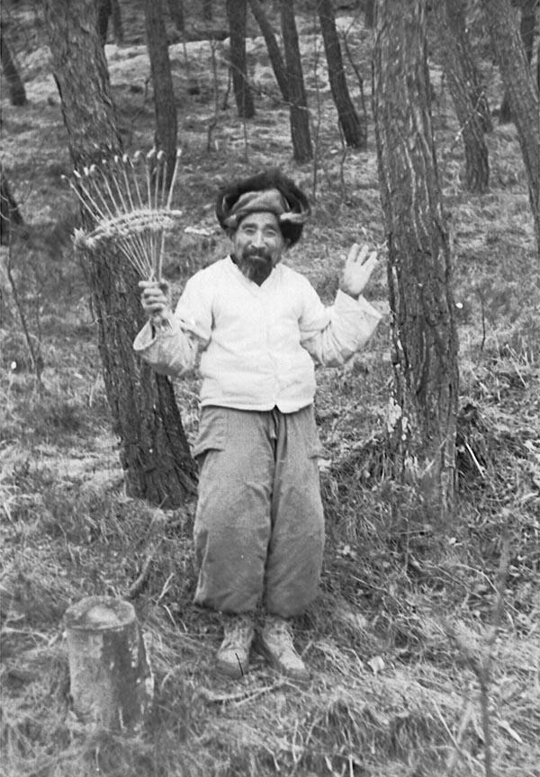 Brush collector saying Hi In the hills north of Seoul, Korea. 1952.jpg