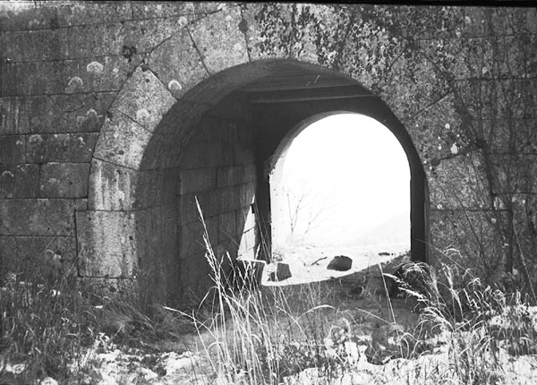 Passage way through wall in the hills north of Seoul, Korea 1952.jpg