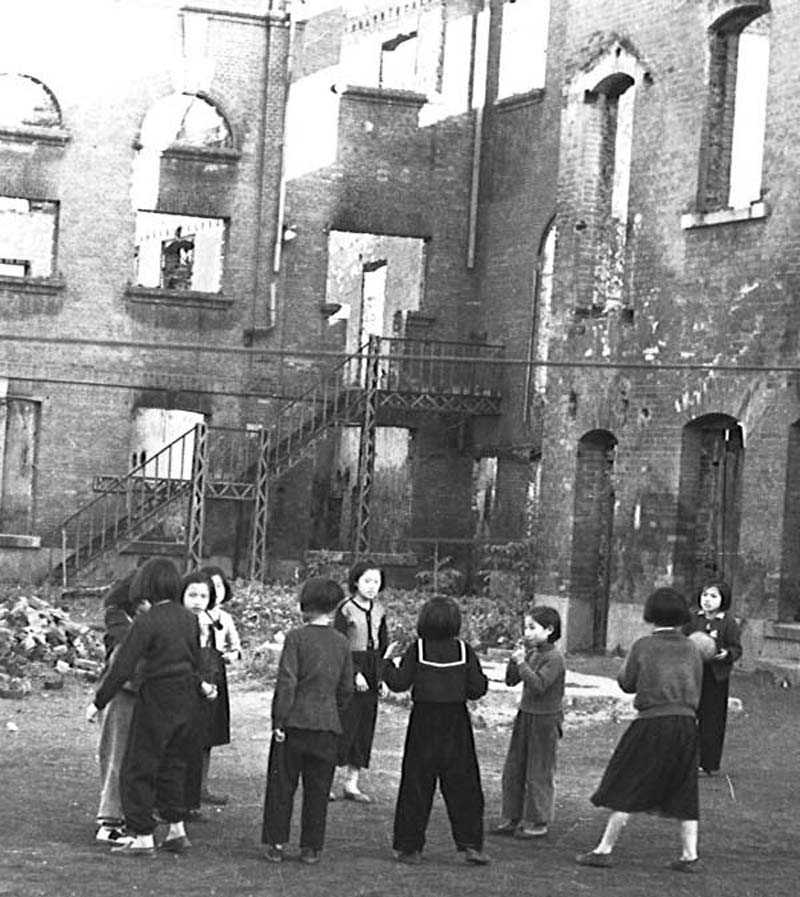 School girls playing in the rubble of the war. Seoul, Korea, 1953.jpg