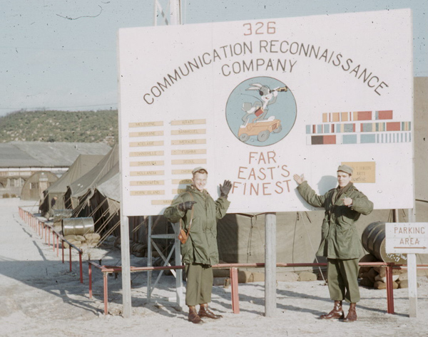 George F. Drake (right) with buddy in front of 326th CRC Sign Board.jpg