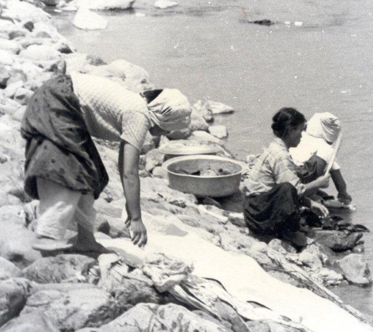 156 Korean Women Washing their clothes on the riverbank.jpg