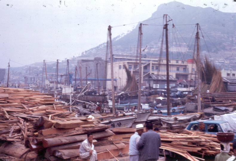266 Unloading Lumber in Pusan Harbor.jpg
