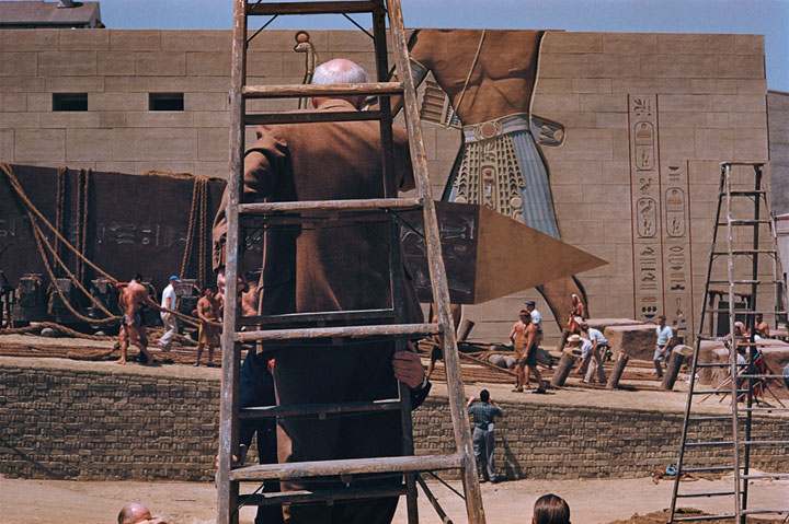 Cecil B. DeMille on a ladder of the Ten Commandments1956.jpg