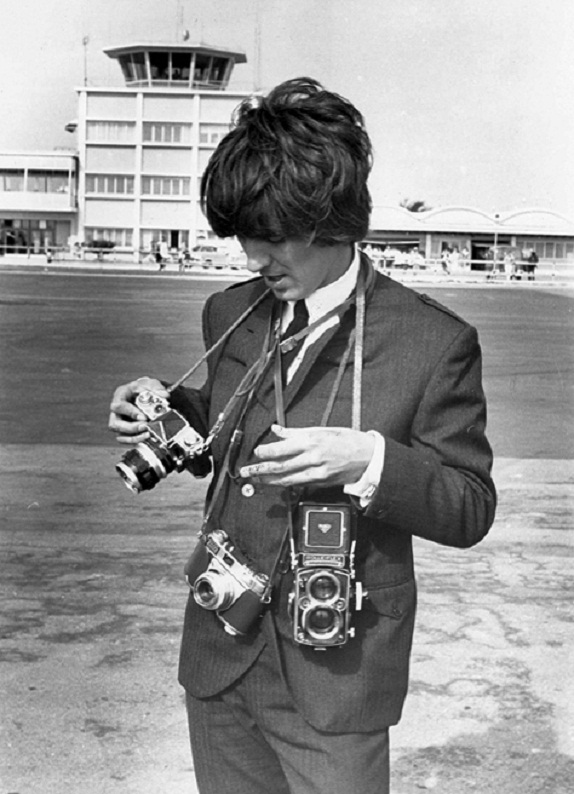 George-Harrison-with-left-to-right-A-Nikon-F-A-Kodak-Retina-IIS-and-his-Rolleiflex.jpg