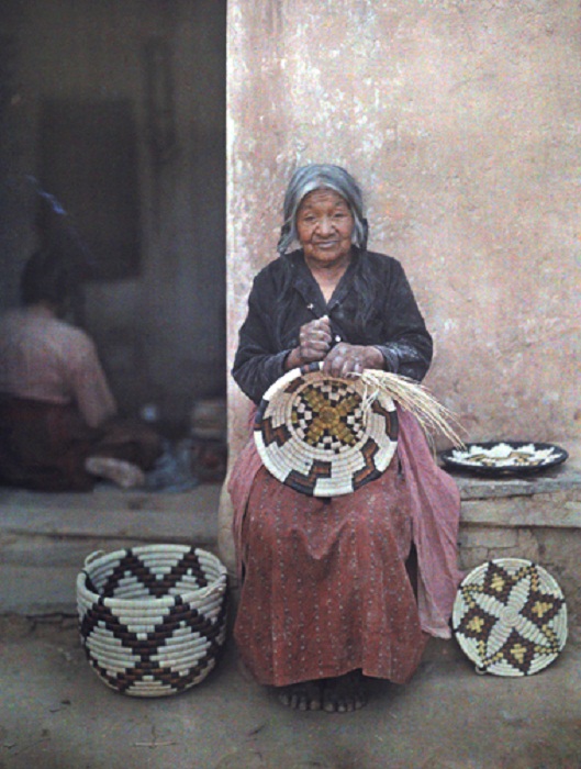 Arizona-Portrait-of-a-Hopi-Indian-holding-one-of-the-baskets-shes-made.jpg