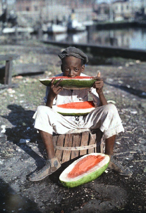 Louisiana-An-informal-portrait-of-a-young-New-Orleans-boy-eating-watermelon.jpg