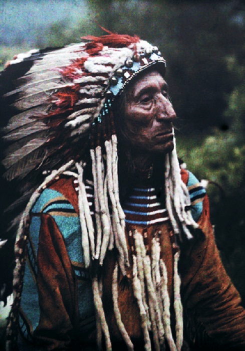 Montana-Portrait-of-a-Flathead-chief-adorned-in-strips-of-the-popular-ermine-Glacier-National-Park.jpg