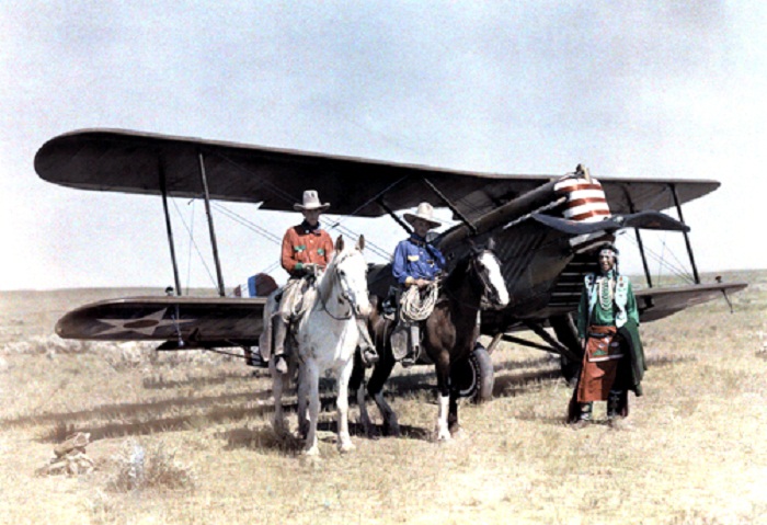 Montana-Three-men-stand-in-front-of-a-plane-on-the-Crow-Reservation.jpg