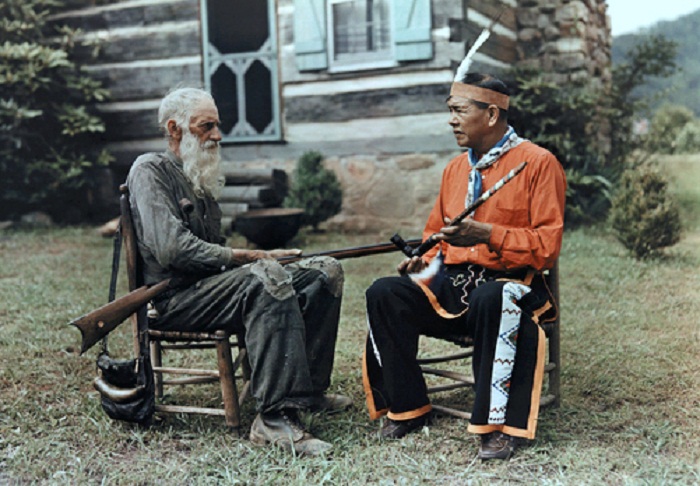 Tennessee-An-Appalachian-man-converses-with-an-Indian-in-front-of-a-log-cabin-Great-Smoky-Mountains-Near-Gatlinburg.jpg