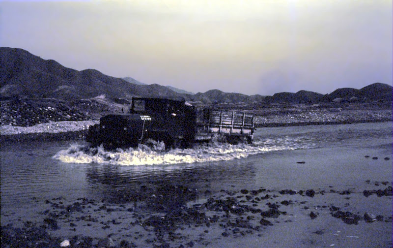 053_-_Magnetto_washing_truck_in_river.jpg