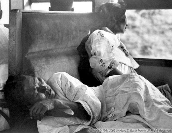21-two-women-sleeping-on-train.jpg