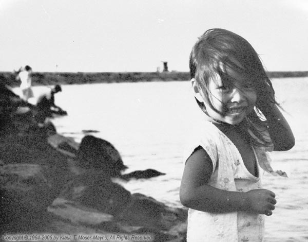 36-young-girl-on-beach-jeju-island.jpg