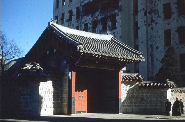 Gate to house and bombed building-Seoul-Jan. 1953.JPG
