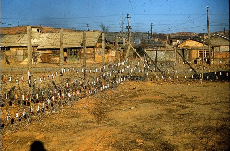 Looking out at nearby Korean village-121st Evac Hosp-Jan 1953.JPG