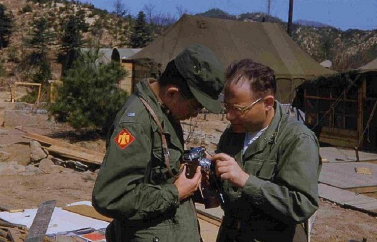 Showing my camera to Lt. Lui 45th Div MD-April 1953.JPG