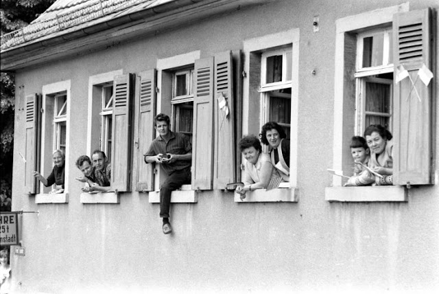 21 People watch from windows during President John F_ Kennedy