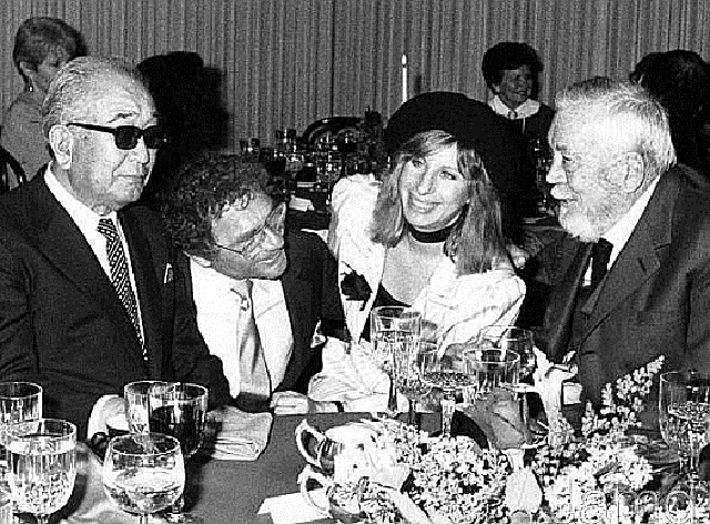 Akira Kurosawa, Sydney Pollack, Barbara Streisand and John Huston.jpg