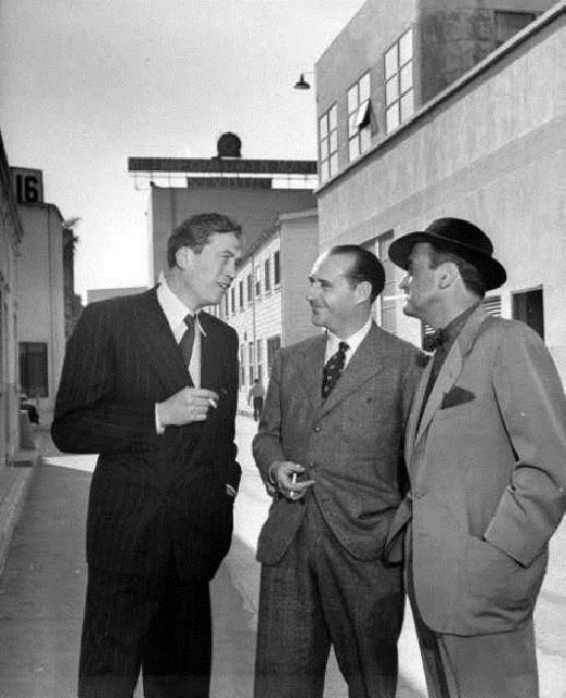 John Huston, Roberto Rossellini and Jean Negulesco.jpg