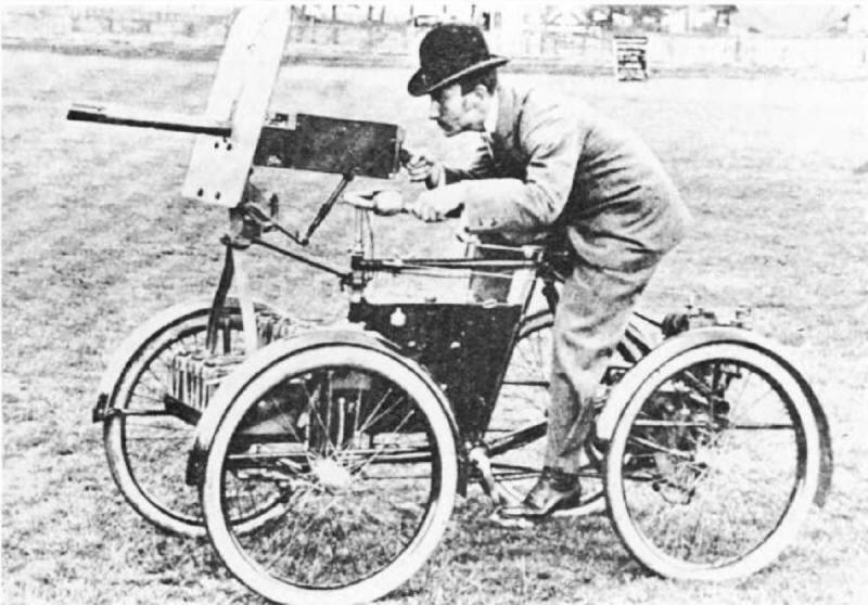 Frederick Simms with his Motor Scout the first armed, petrol engine powered vehicle ever built in 1899..jpg