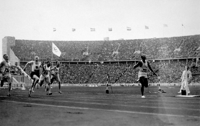 Jesse Owens passes the finish line during the 1936 Olympics, an event that Adolf Hitler used as propaganda for his idea of aryan superiority..jpg