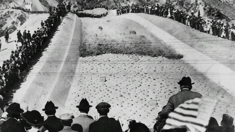 Witnesses watch the waters rool in during the grand opening of the Los Angeles Aqueduct on November 4, 1913..jpg