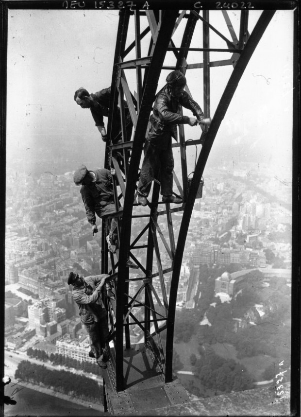 Painting the Eiffel Tower by hand between 1910 and 1920..jpg