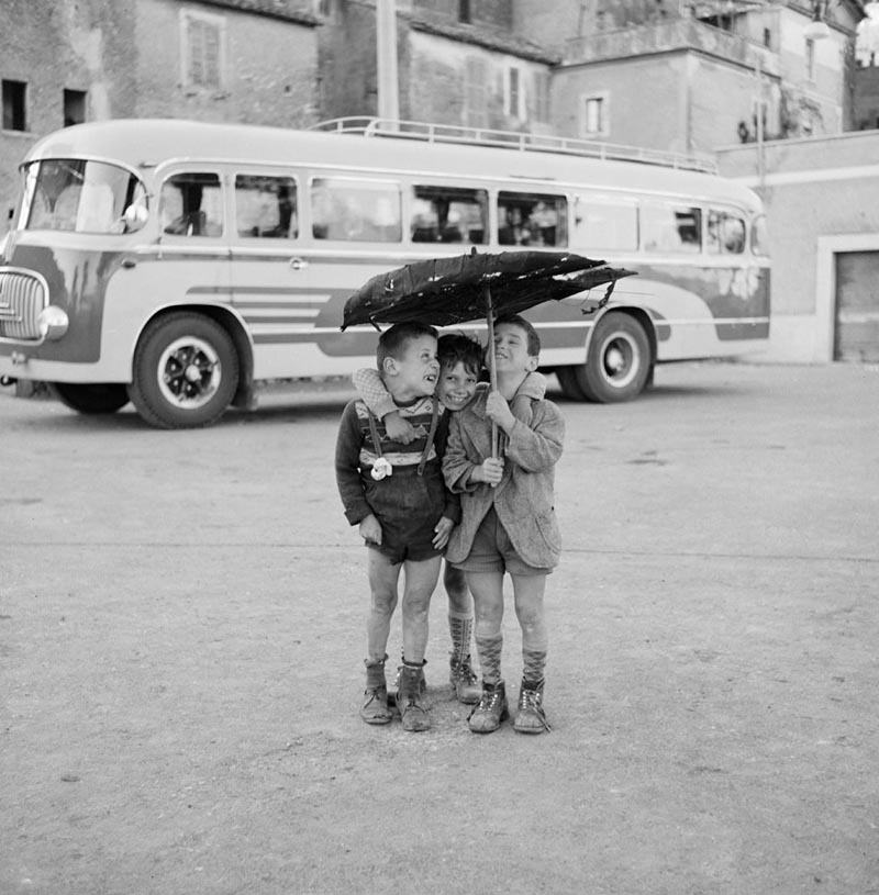 10 Three Boys Under an Umbrella, Rome, 1956.jpg