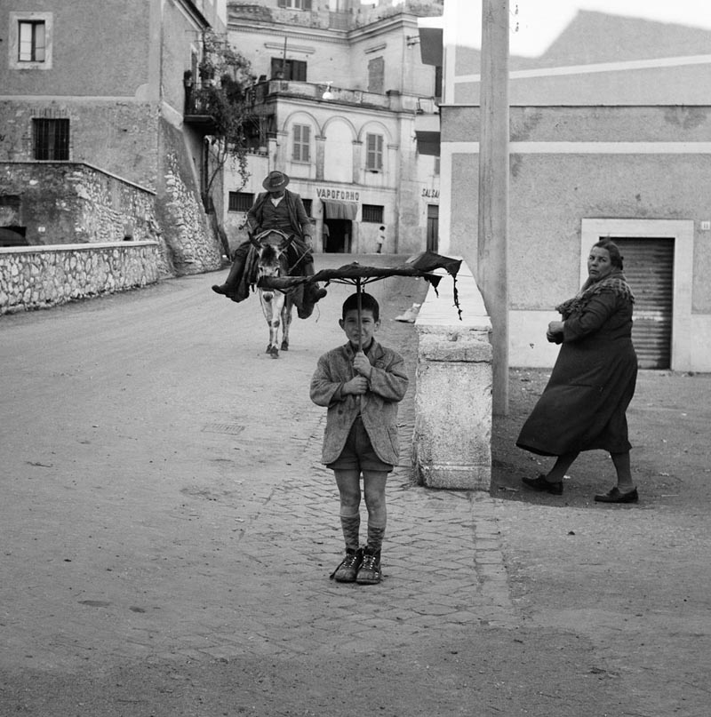 22 Umbrella Boy, Italy, 1956.jpg