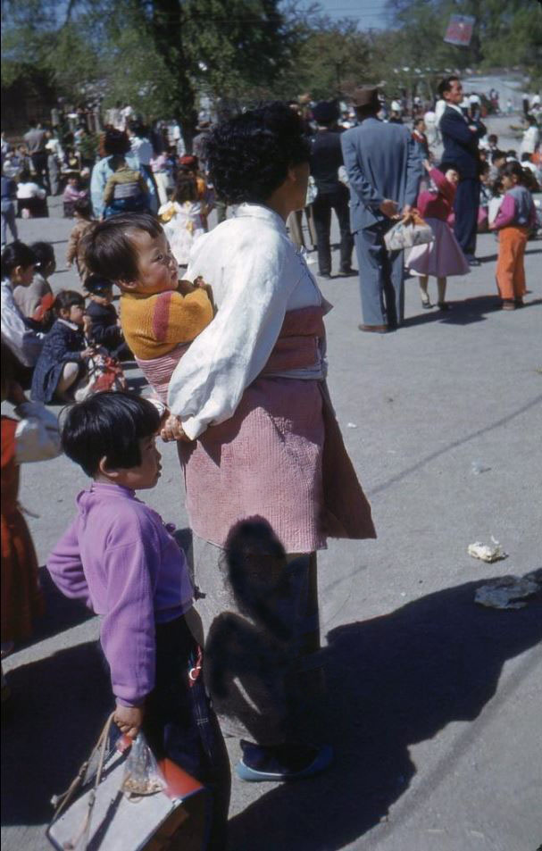 379H Original Slide Local Lady carrying baby Children Fair Seoul Korea 1950s.JPG