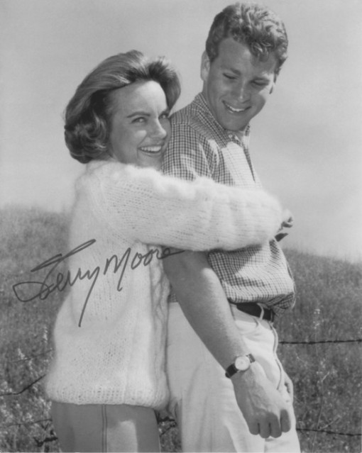Terry Moore and Ryan O’Neal on the set of Empire TV Series (1962–1964).jpg