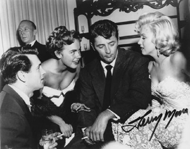Autographed photo of Terry Moore with Rock Hudson, Robert Mitchum and Marilyn Monroe..jpg