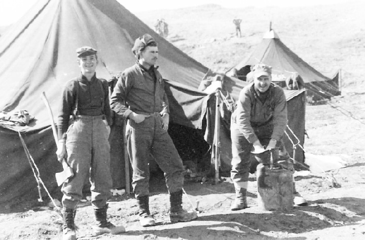 28 Sgt Billy R. Hidy, Sam Fulmer &amp; Lt. Nolan doing his laundry. Feb 1951.jpg