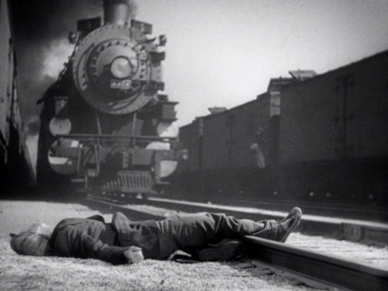Wild Boys of the Road (1933) Edwin Phillips gets a little too friendly with a train.jpg