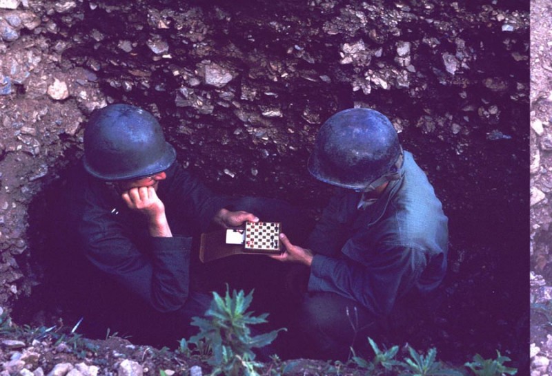 30 I play Chess with Chaplain Ritter during an air raid dril.jpg
