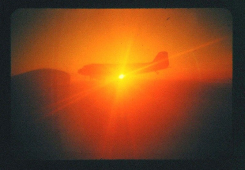 28 Vintage Korea War 1952 35mm Kodachrome Transparency USA C-47 SHOT into SUN #28.jpg