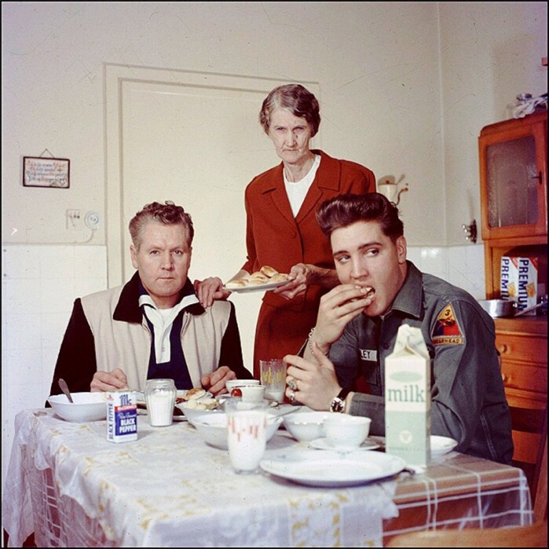 Elvis Presley eating breakfast with his father Vernon, and his grandmother Minnie Mae 1959.jpg