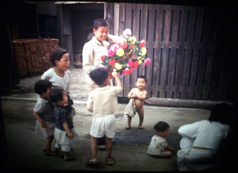 34 35MM SLIDE SEOUL KOREA 1948 CHILDREN WITH FLOWERS.JPG