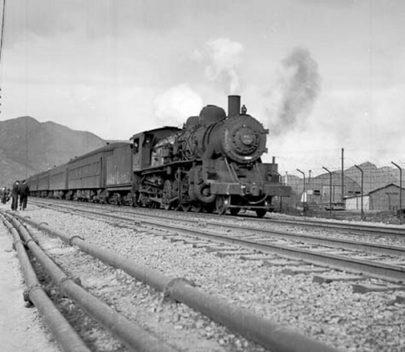 W Peter Dean The locomotive is entering Pusan 1955.jpg